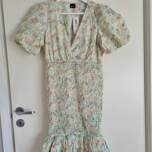 Summer Dress - Super cute brand new. It is a size S but I belive is more of an M. Is midi and super fashionable and retro. Still with tags on
