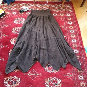 60 talk Manchester kjol - I mycket bra skick och matcherar med allt. Passar 27_ 38 eftersom den stretcher