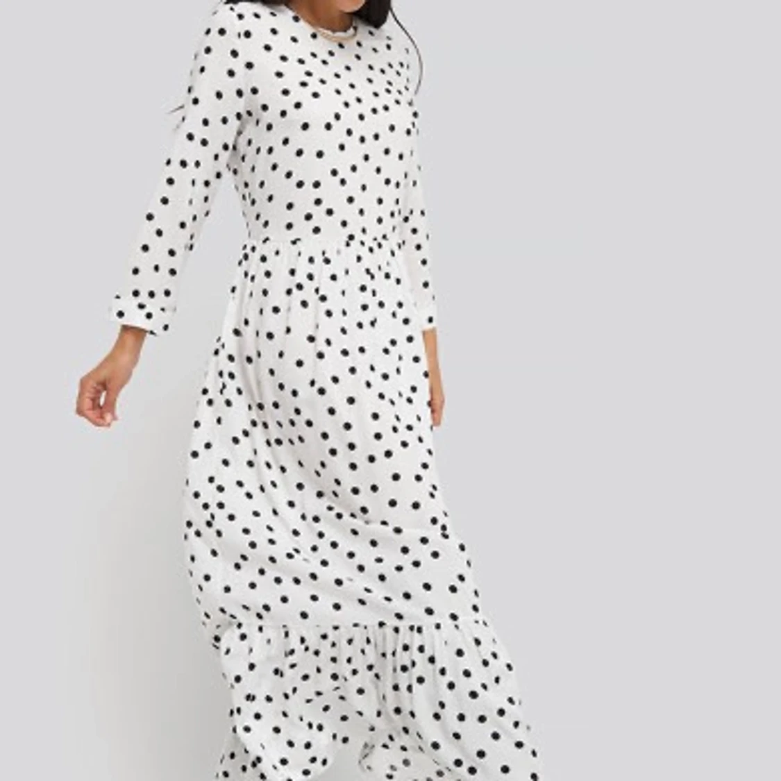 Superfin prickig långklänning