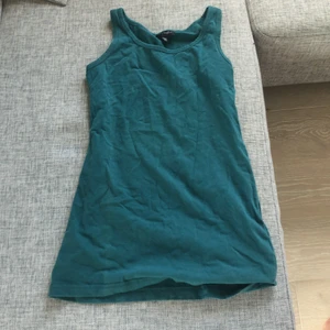 Linne från Kappahl  - Ett grönt linne från Kappahl i storlek 134/140