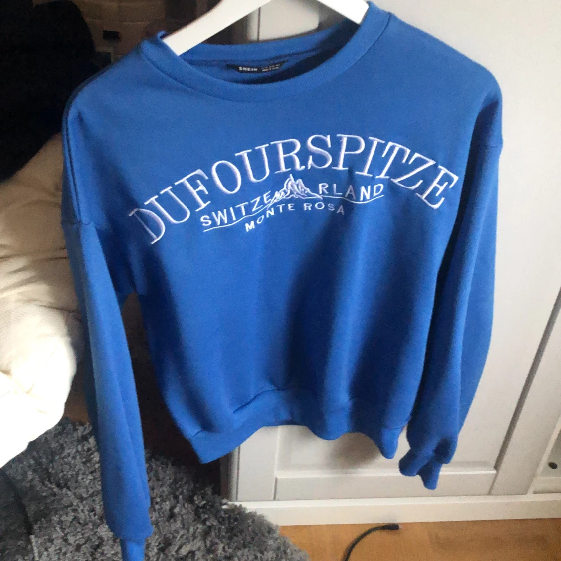 Blå sweatshirt