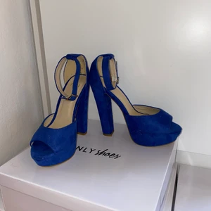 Klackskor från Nelly storlek 38 - Klackskor från Nelly (höjd ca 10 cm) storlek 38. Använt en gång. Säljer för 200kr