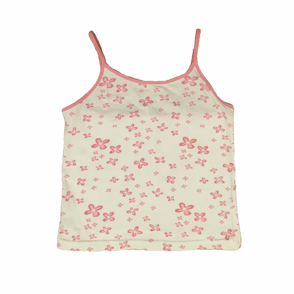 snyggt y2k linne med blommor! baby topp som passar xs, jättesnygg på!💕 vitt med rosa detaljer. Toppar.