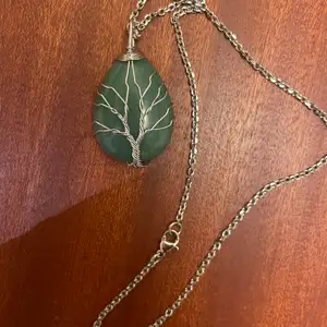 Handmade green stone with wire detail
