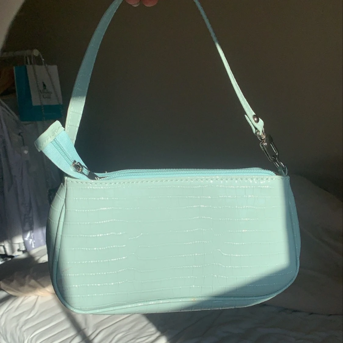 Ljusblå väska