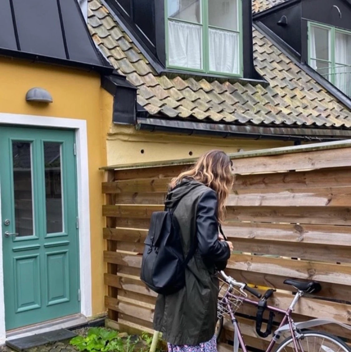 Rains black waterproof backpack 