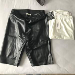 Helt nya biker shorts/leggins. Oanvända. Den vita har prislapp men råkat ta bort på dem svarta. Båda är från Nly och är i storlek S.