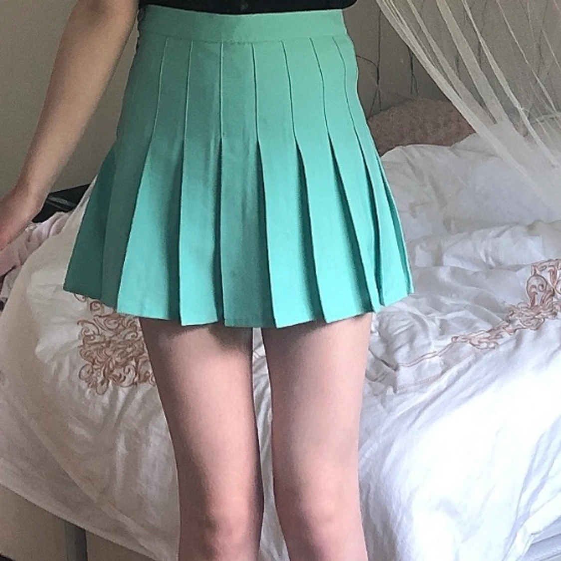 Fin turkos tenniskjol i XS