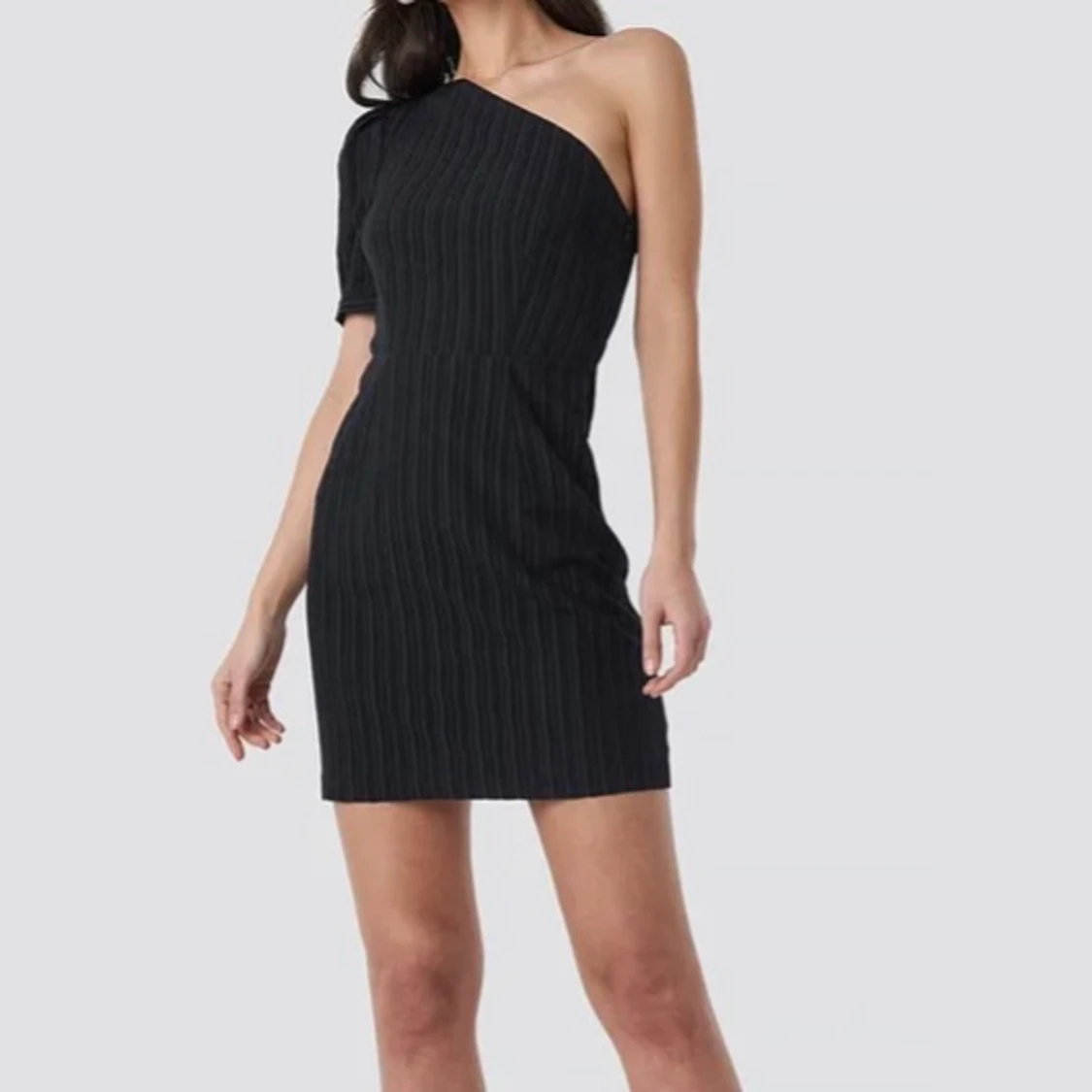 Oneshoulder klänning