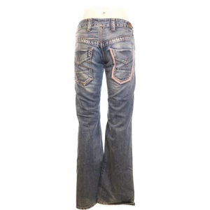 Pepe Jeans 26/32 - Lågmidjade jeans från Pepe jeans. Kan mötas i Stockholm eller frakta spårbart.