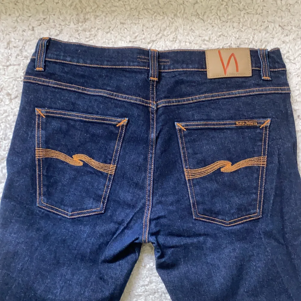 Ett par fina jeans från Nudie Jeans CO, i mycket bra skick. Modell Lean Dean. De är i storleken 34/32. Jag säljer de för 700kr + frakt, pris kan diskuteras genom att kontakta mig. (Jag säljer åt någon annan). Jeans & Byxor.