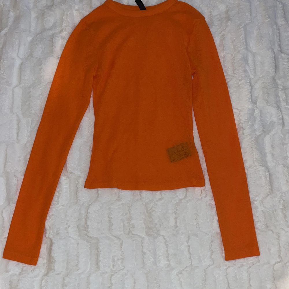 Genomskinlig orange tröja | Plick Second Hand