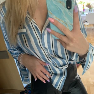 Skjorta i siden - Frakt ingår i priset