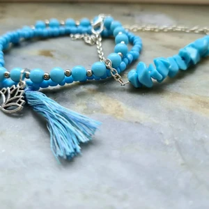 Blått armband med Lotus - Armband iI blått och silver med lotus+tassle