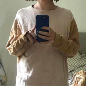 Carin Wester rosa/brun tröja - En underbar tröja från Carin Wester i rosa och brunt. Passar bra både under sommarkvällar och sen till hösten när man vill pigga upp sig med lite färg.