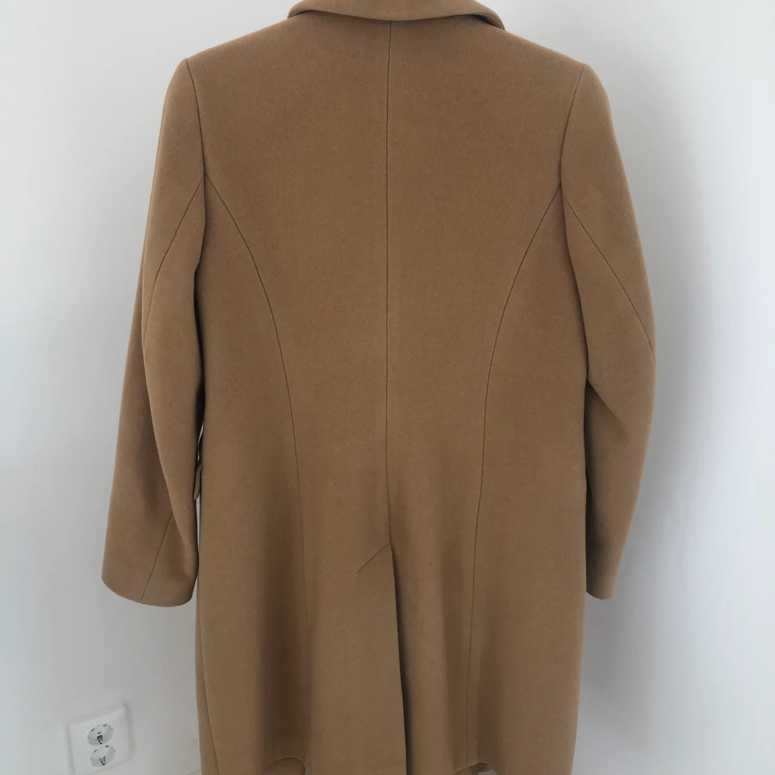 Brun kappa från NEWHOUSE storlek 34 - 91