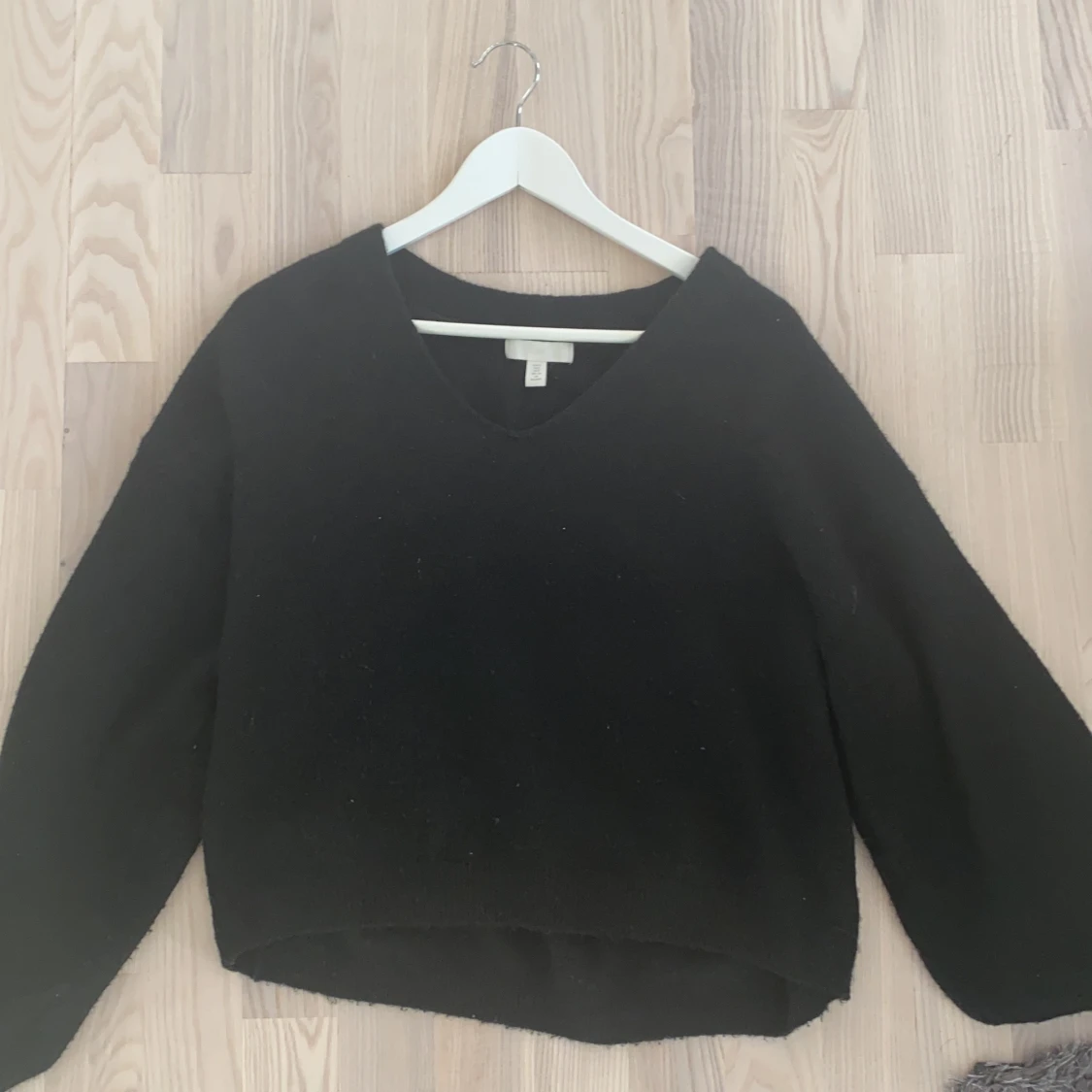 Svart stickad tröja