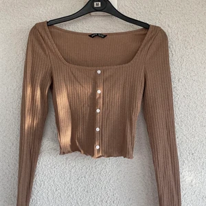 Topp - En oanvänd top från shein, den är i stl xs men är väldigt tight så mer som xxs