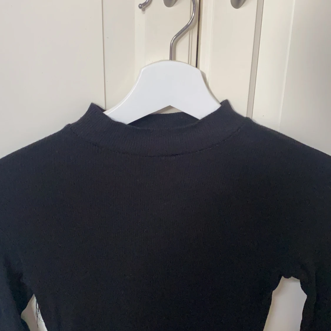 Svart topp från Nelly - 90