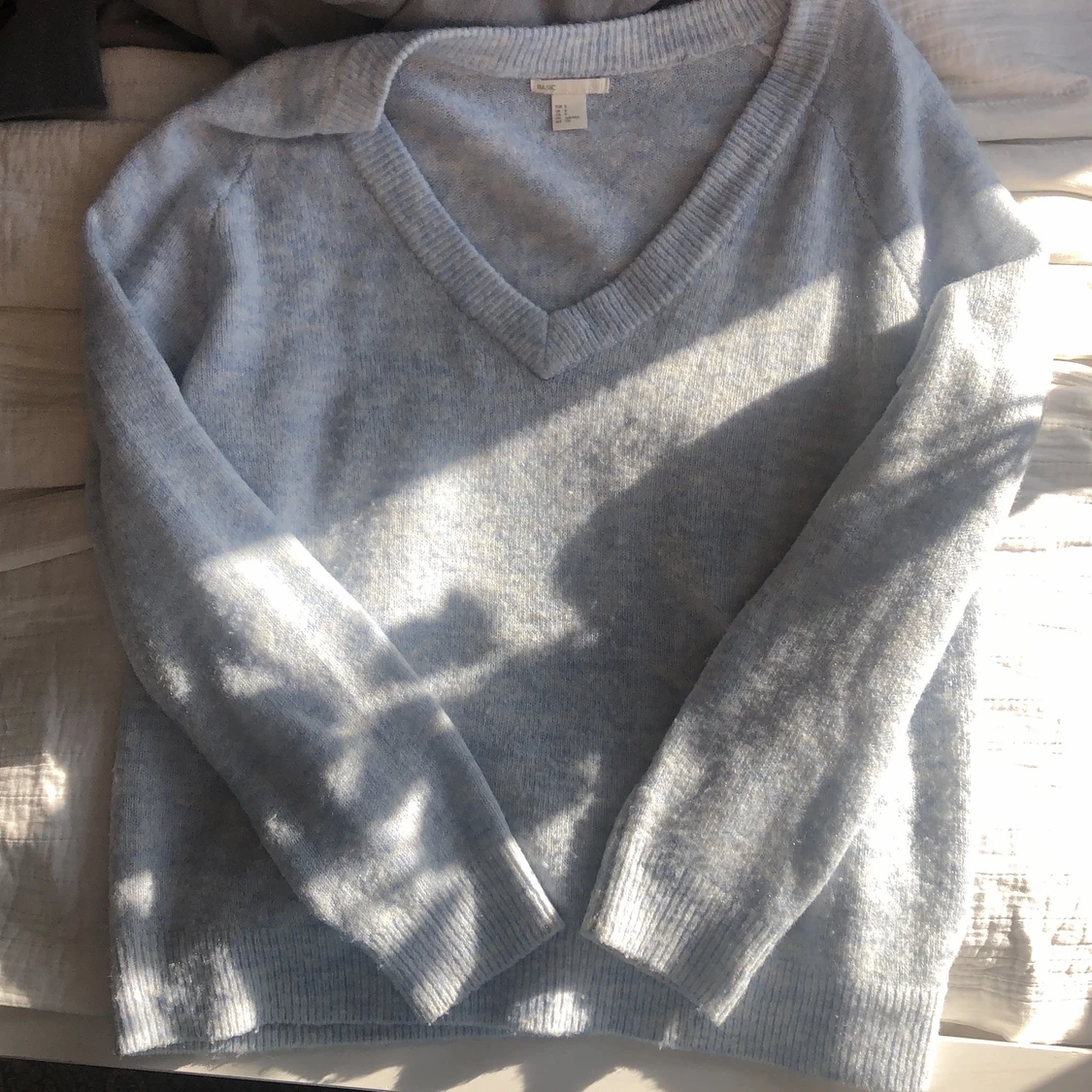 Ljusblå stickad - 90