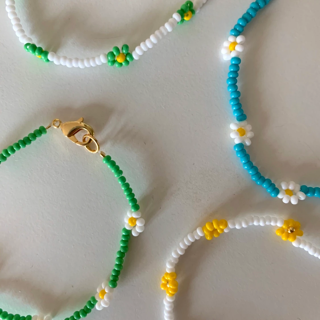 Blommiga armband  - 90