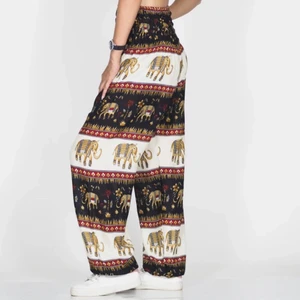 Royal Elephant men/women Harem Pants  - Super comfortable light weight soft, draw string harem/Genie, casual, double stitched pants, fits all body types. Each pair is unique and may slightly vary from the picture.  One size  Waist 24-44" - 57 cm to 108 cm  Hip 54 - 138 cm  Length 41" - 105 cm  100% Rayon