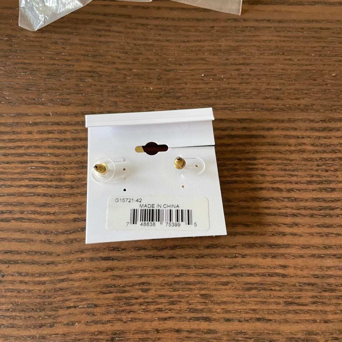 Guldiga örhängen från Guess - 2