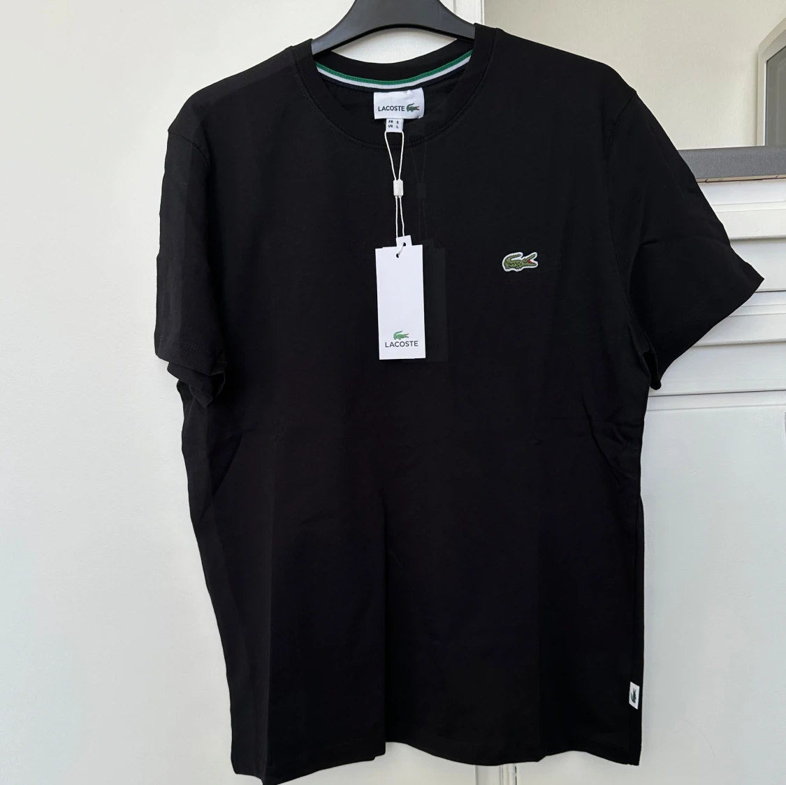 Svart t-shirt från Lacoste - 1