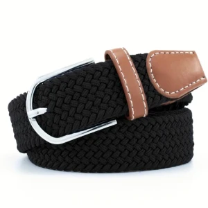 Svart flätat bälte med bruna detaljer - Snyggt svart flätat bälte med bruna läderdetaljer och ett silverfärgat spänne. Perfekt för att ge en stilren touch till din outfit.
