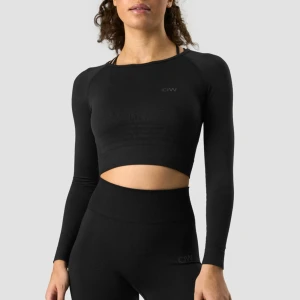 Svart croppad långärmad träningströja från ICANIWILL - Säljer en svart croppad långärmad träningströja från ICANIWILL. Tröjan har en ribbad, bred mudd nedtill och diskret logga på bröstet. Perfekt för gymmet eller andra träningspass. Endast använd 2 gånger 💕