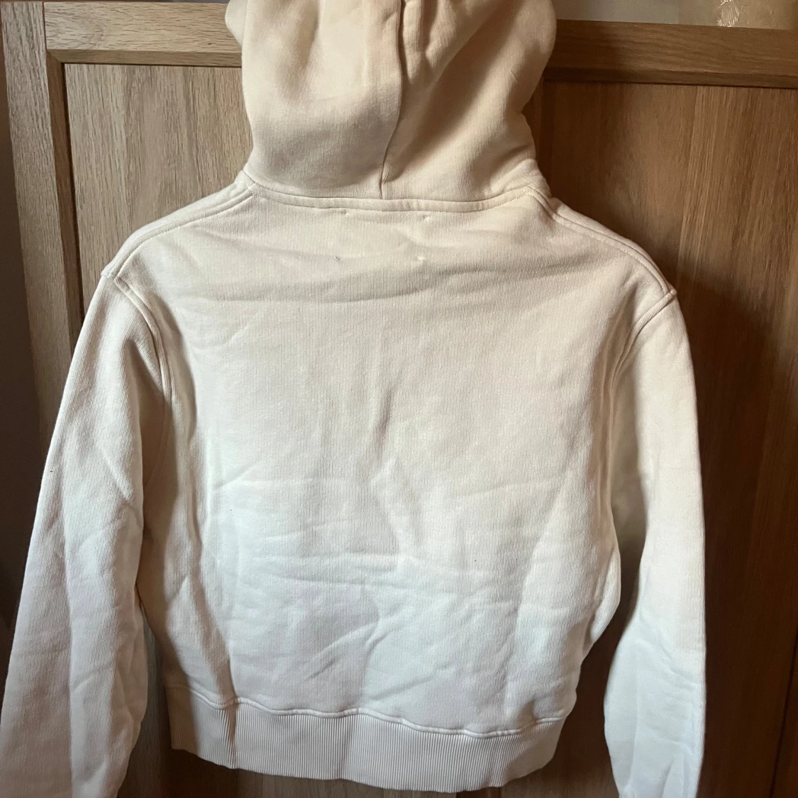 Beige hoodie från Axel Arigato - 1