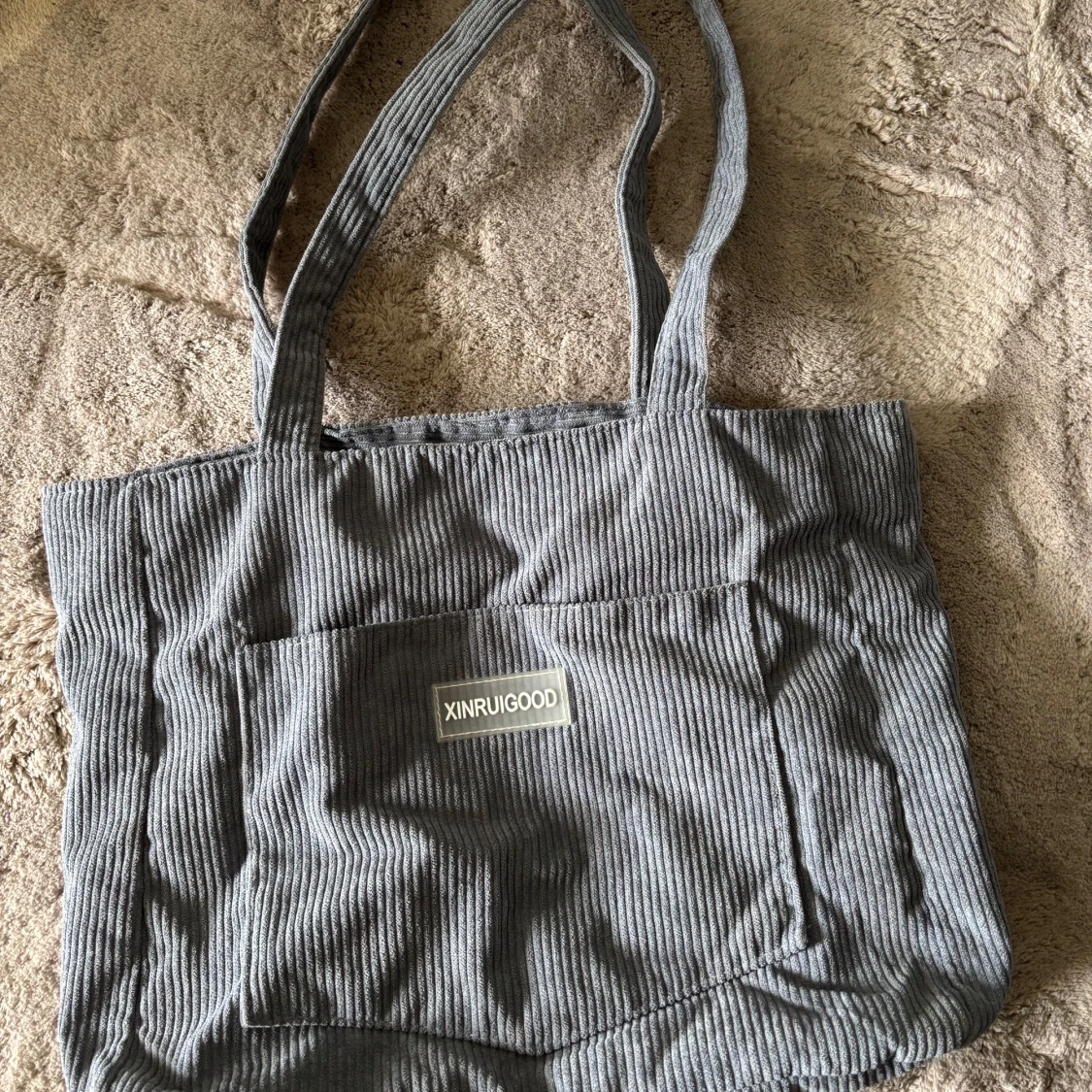 Grå/blå manchesterväska