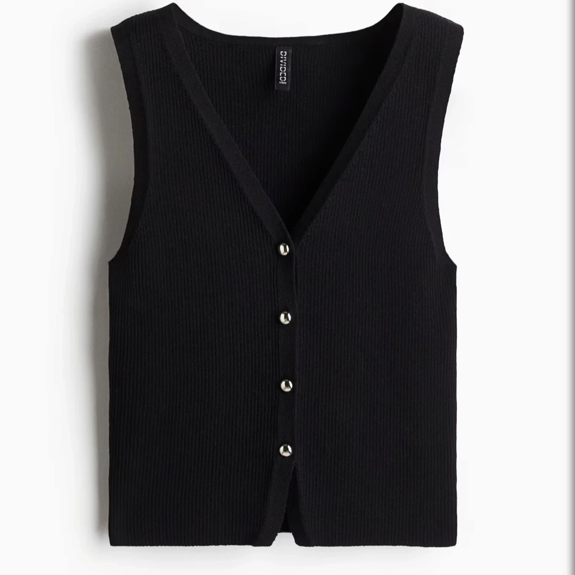 Svart väst/topp
