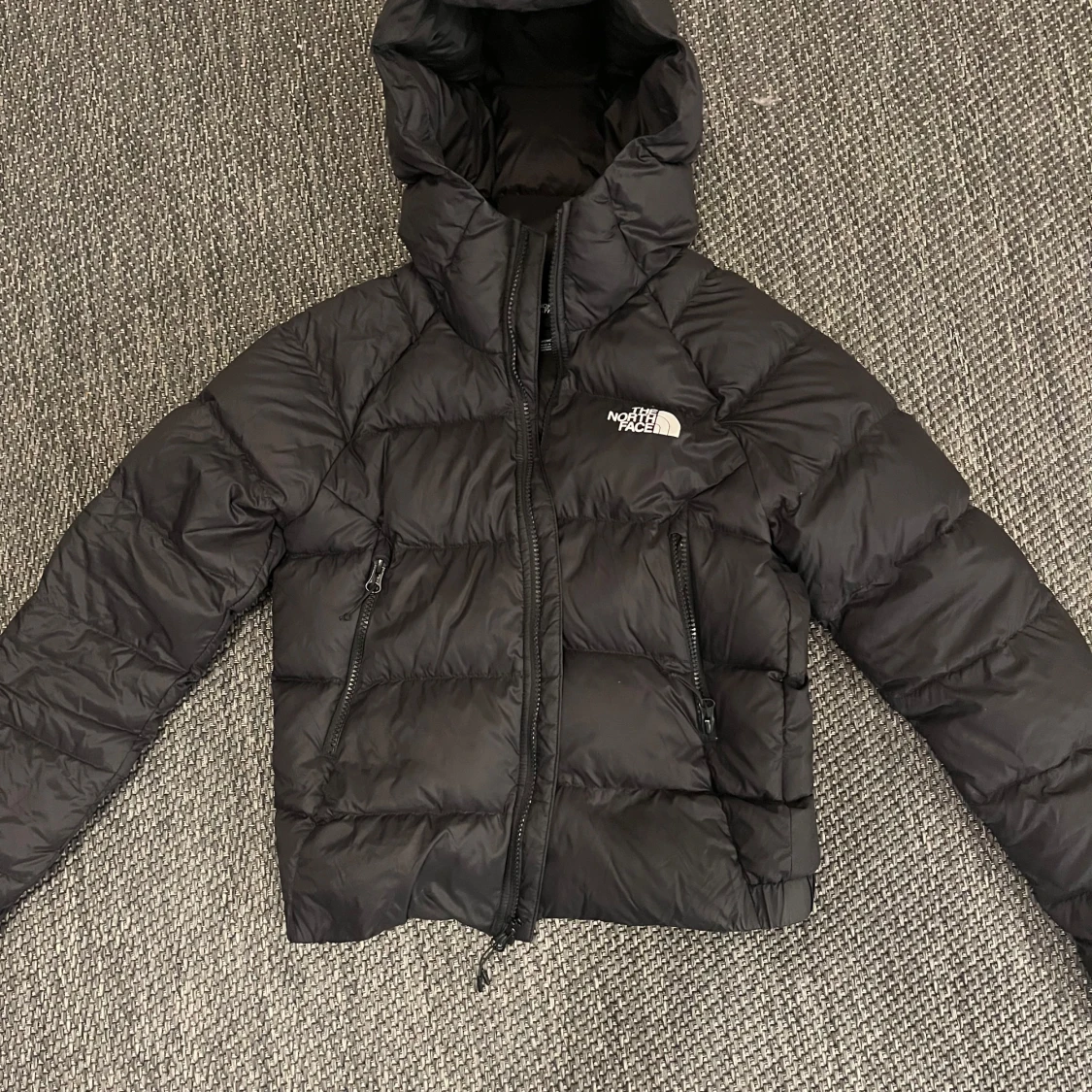 Svart pufferjacka från The North Face XS