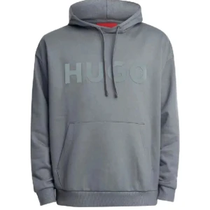 Hugo boss hoodie - Säljer en stilren grå hoodie från Hugo med stor logga framtill. Tröjan har huva med snörning, magficka och ribbade muddar. Perfekt för dig som gillar en clean och avslappnad look. Materialet är mjuk bomullsmix som känns skönt mot huden. Storlek M men passar S