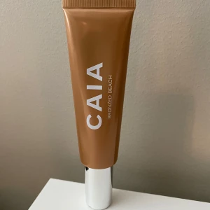 Caia liquid highlighter - Caia liquid highlighter i färgen Bronzed Beach, oanvänd