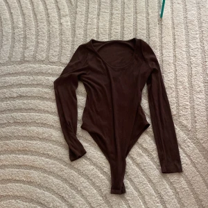 Brun bodysuit  - Använt 2 gånger