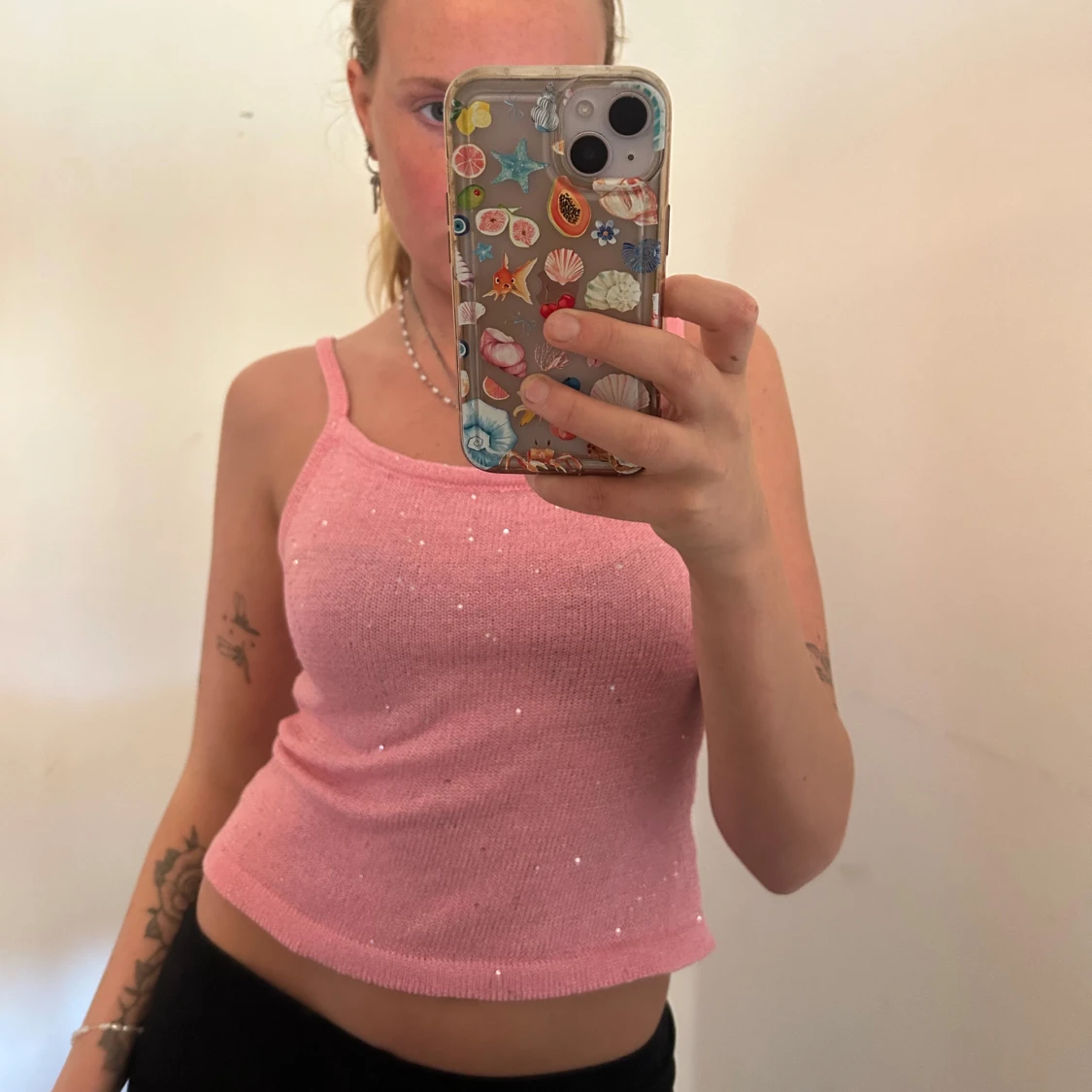 Rosa glittrig linnetopp