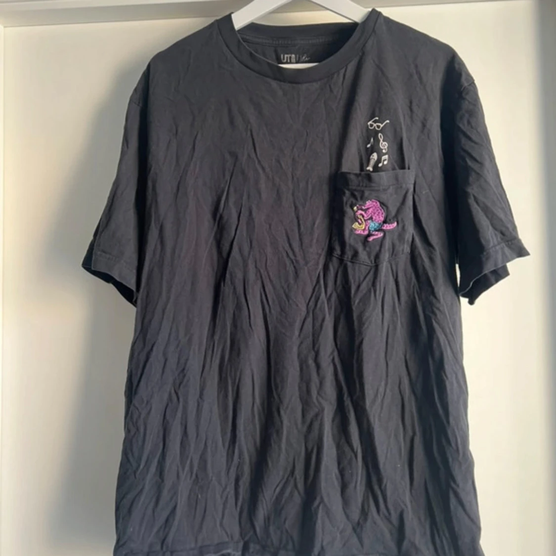 Svart t-shirt från UT x Tim