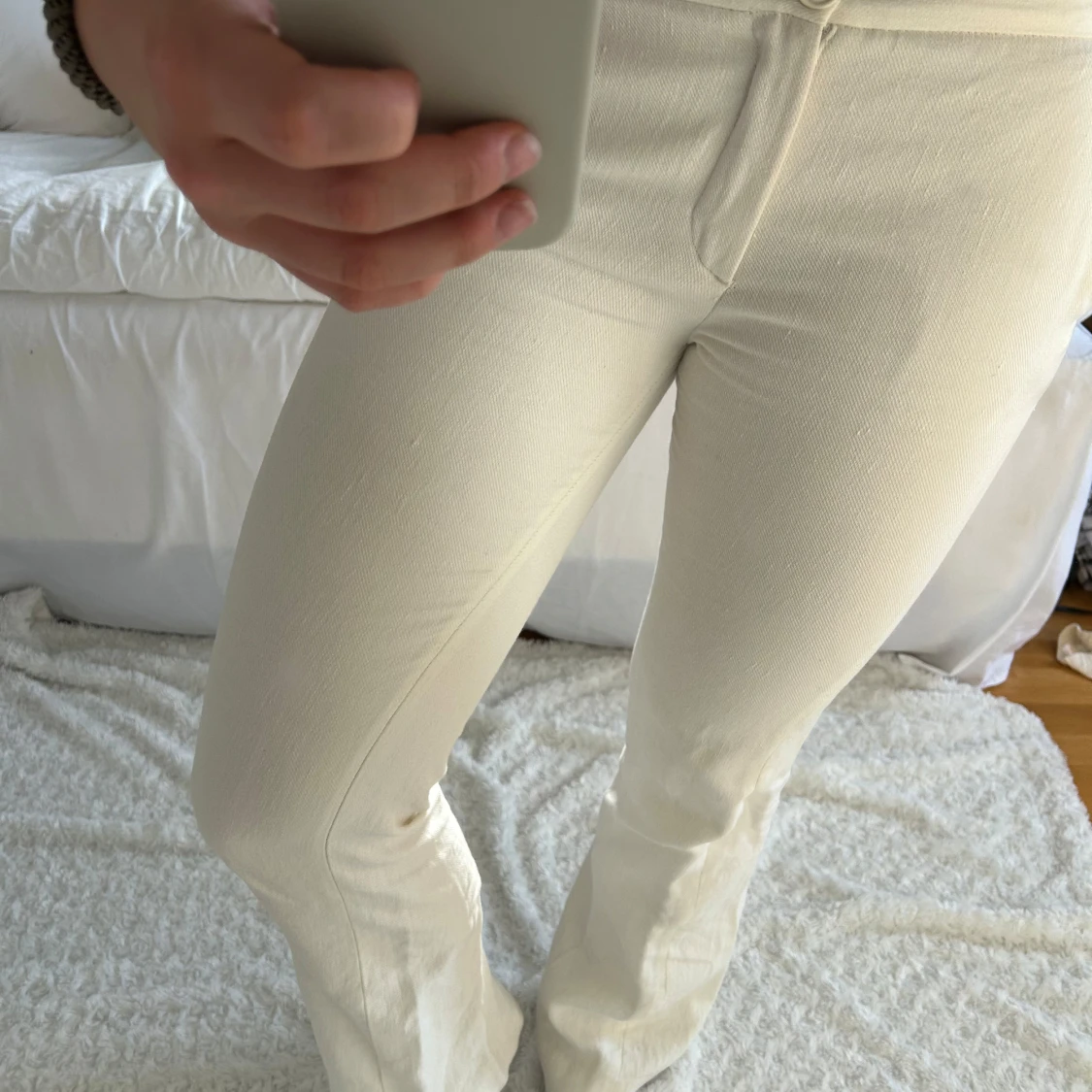 Vita bootcut kostymbyxor