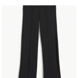 Svarta kostymbyxor  - Snygga svarta kostymbyxor, aldrig använda