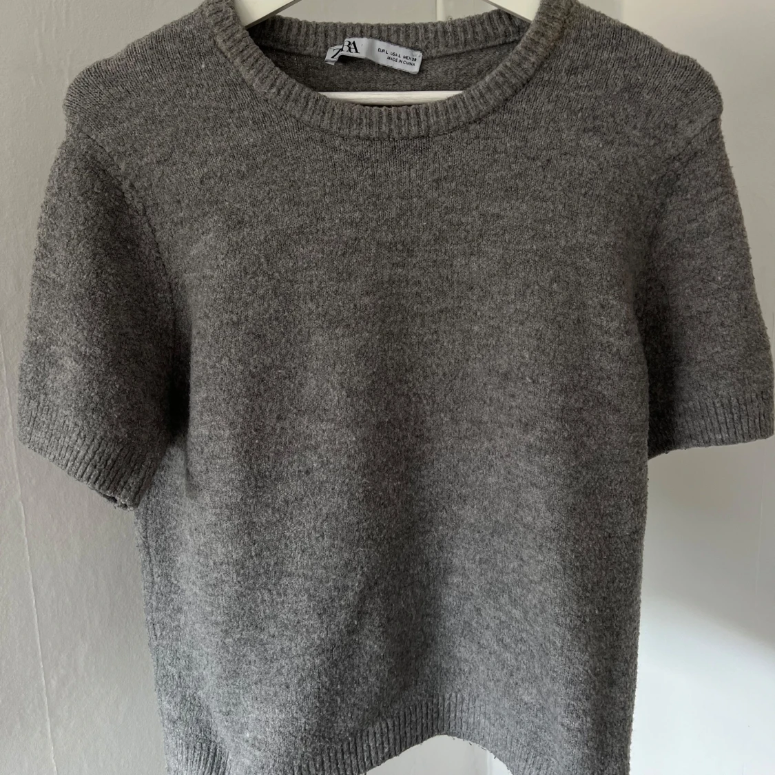 Grå stickad tröja från Zara