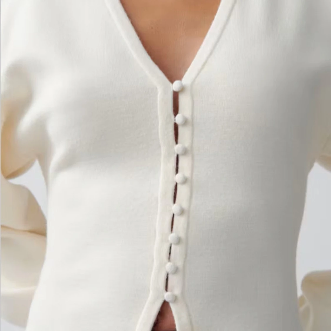 Vit kofta med knappar - 1