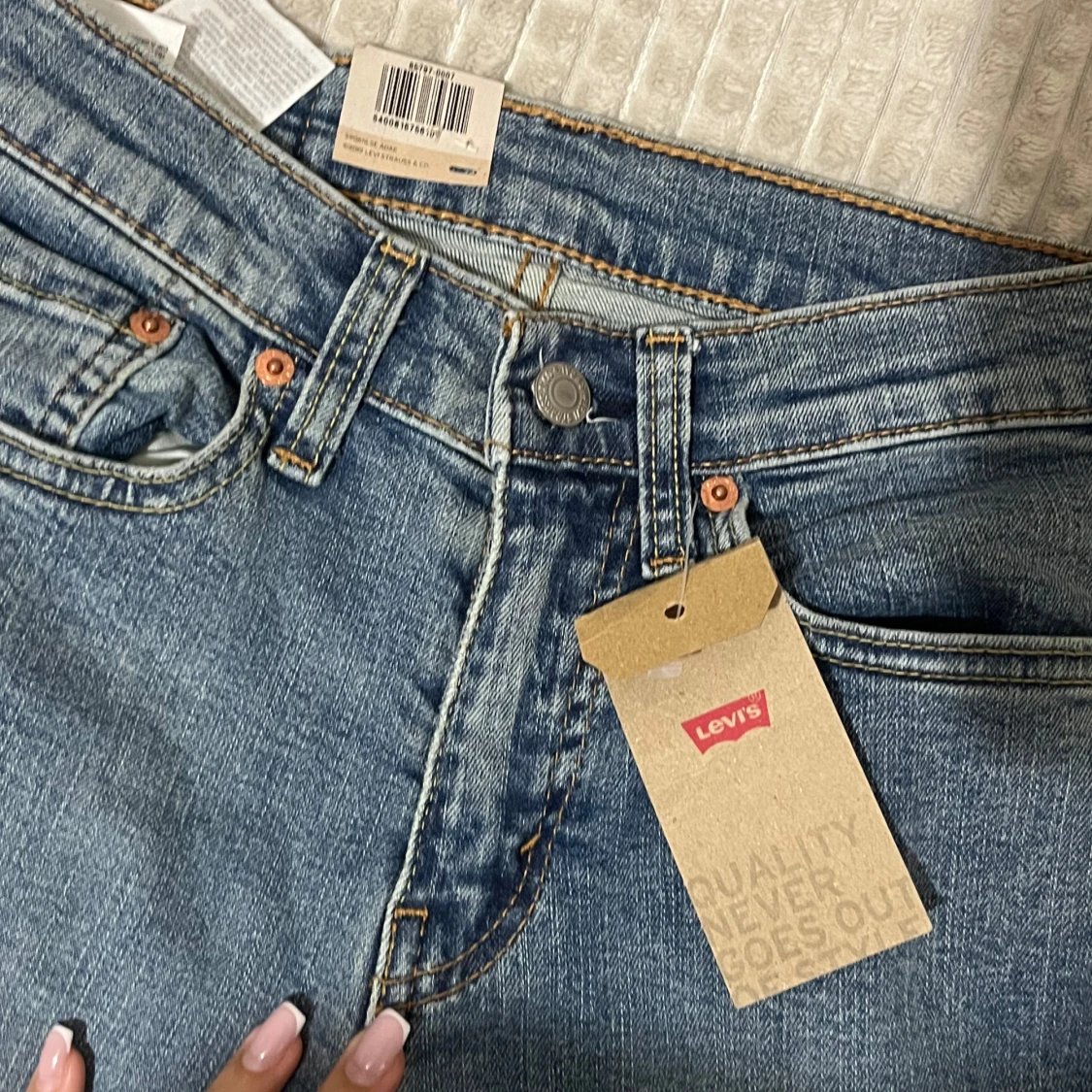 Levi's 519 blå stretchjeans W26 - 1