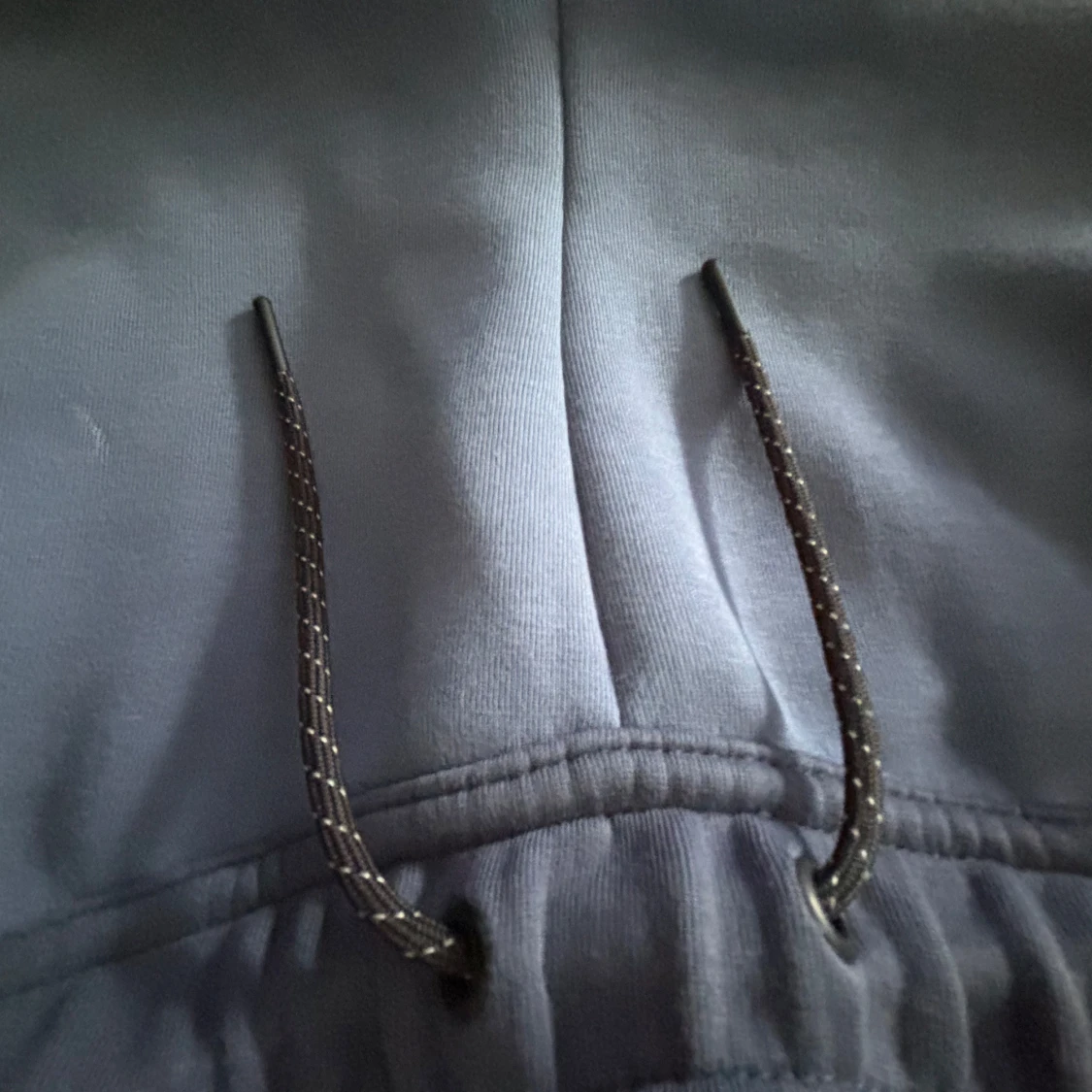 Blå mjukisbyxor från Nike med snörning