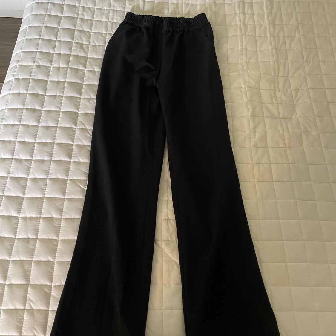 Högmidjade kostymbyxor 