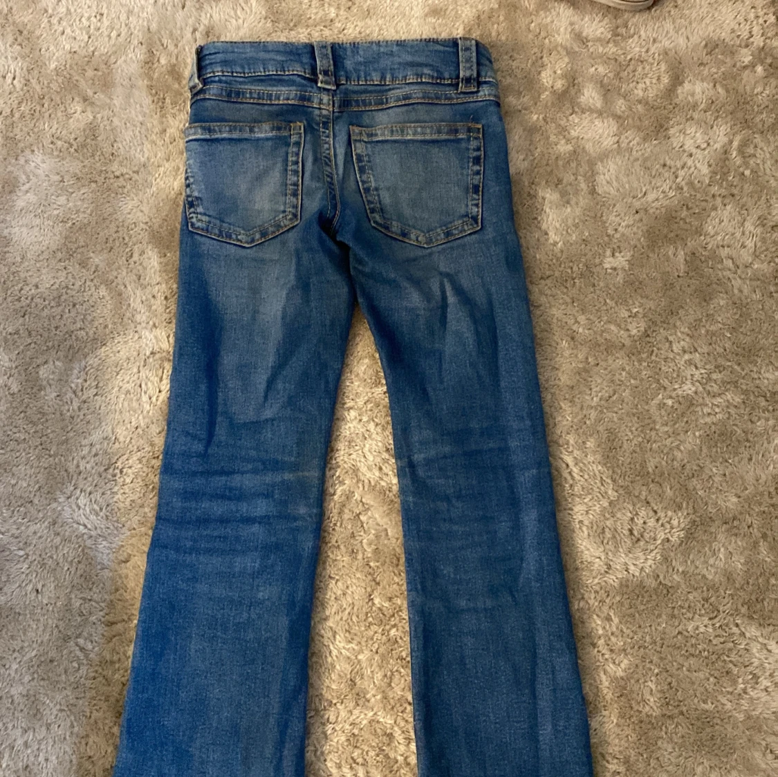 Blå bootcut jeans Gina Tricot 146 - 1