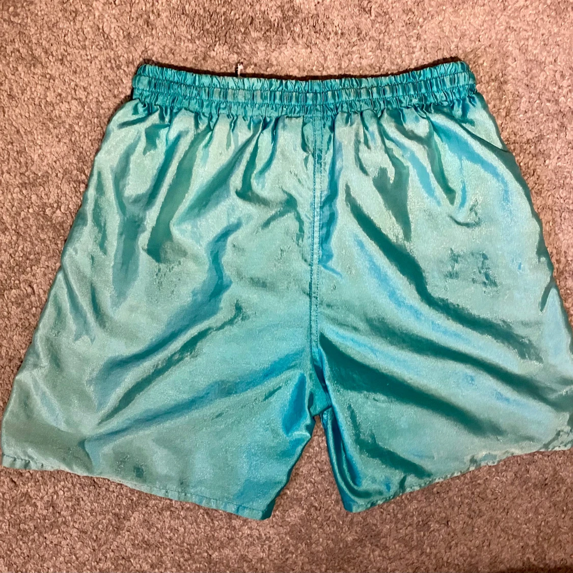 Turkosa shorts från Puma med logga - 1