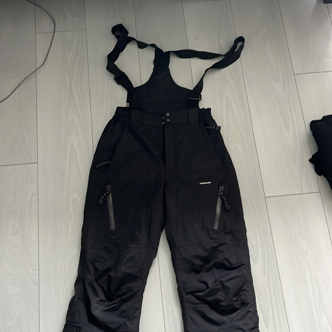 Svarta täckbyxor Base Camp S