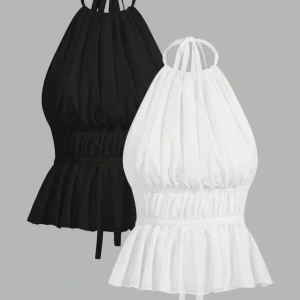 Svart och vit halterneck topp  - . Aldrig använda Stl s